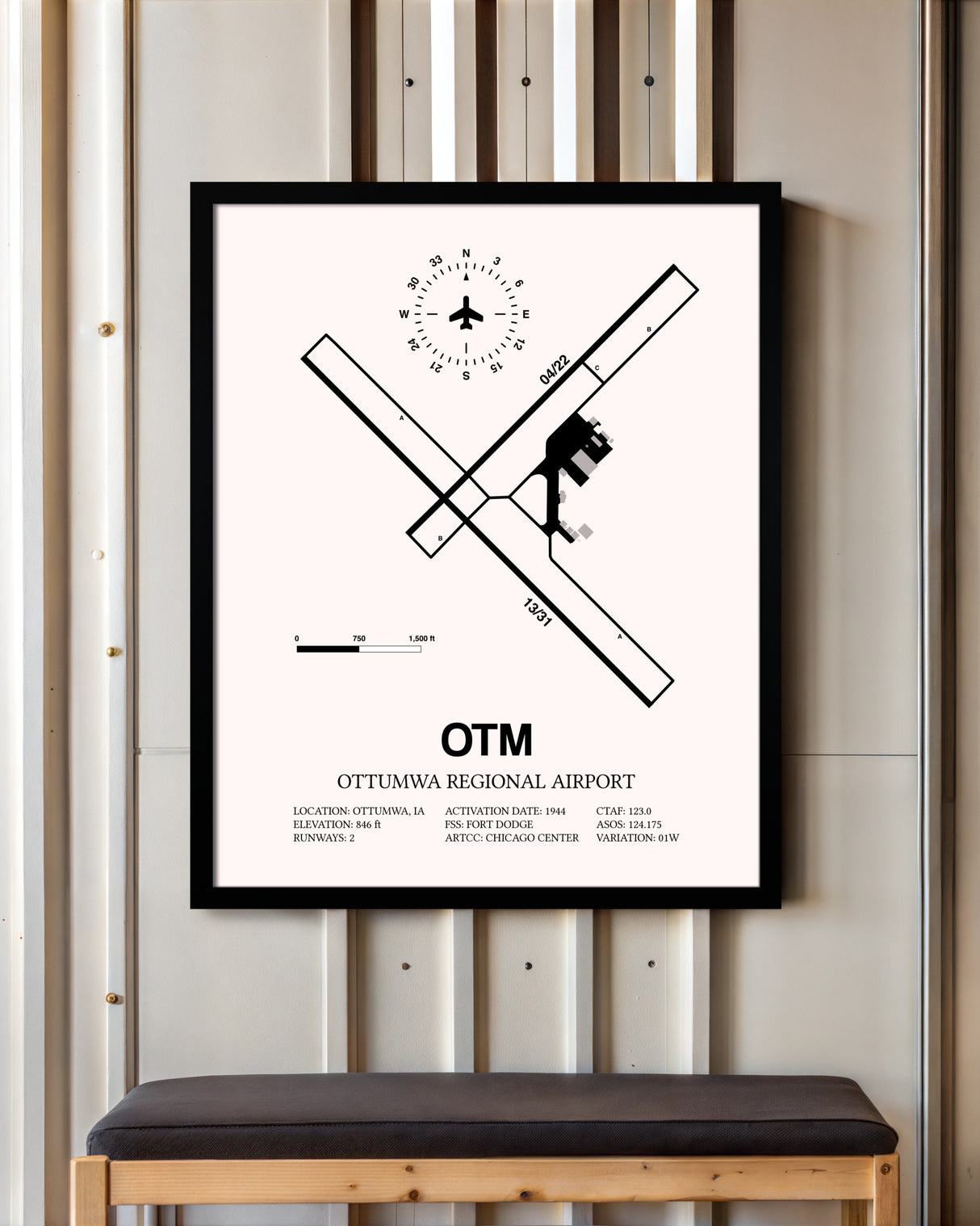 Ottumwa Regional Airport framed poster displayed in an airplane hangar