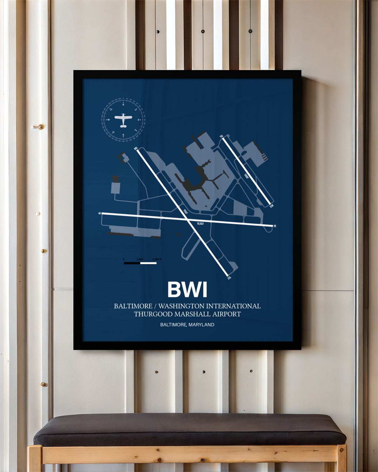 Baltimore/Washington International Thurgood Marshall Airport framed poster displayed in an airplane hangar