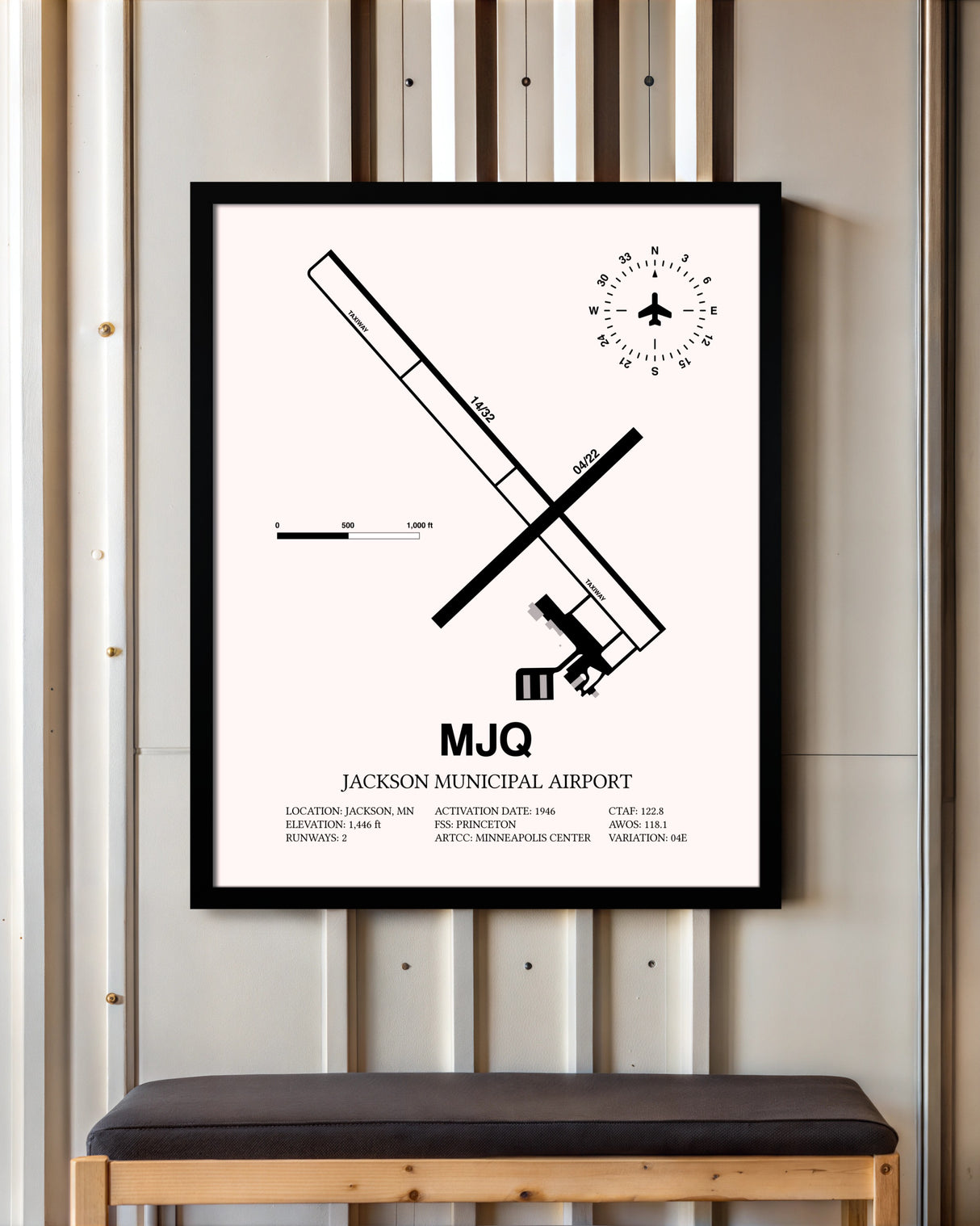 Jackson Municipal Airport framed poster displayed in an airplane hangar