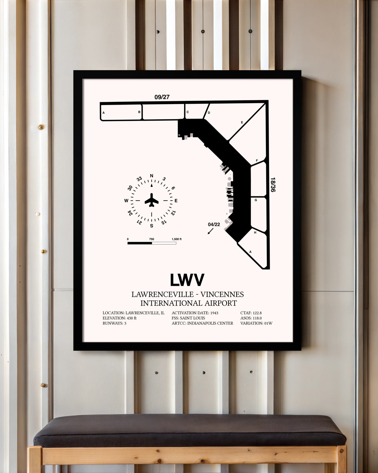 Lawrenceville-Vincennes International Airport framed poster displayed in an airplane hangar