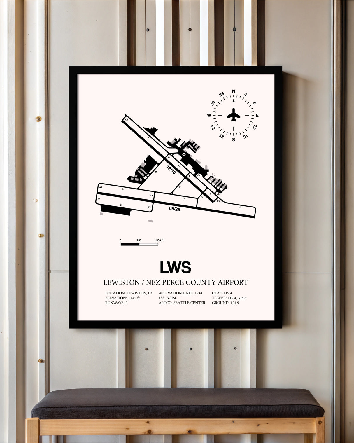Lewiston / Nez Perce County Airport framed poster displayed in an airplane hangar