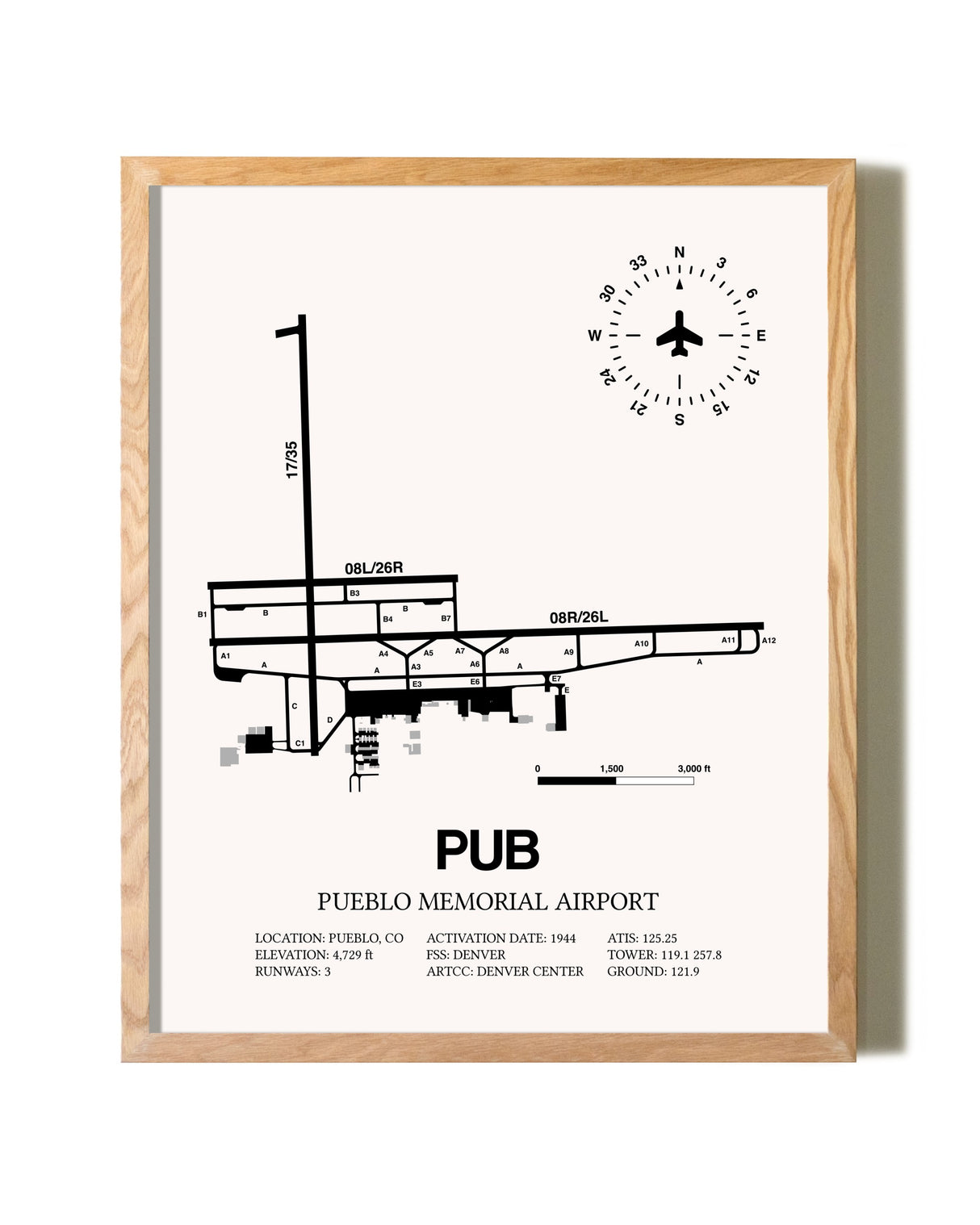 Pueblo Memorial Airport framed print in natural wood frame