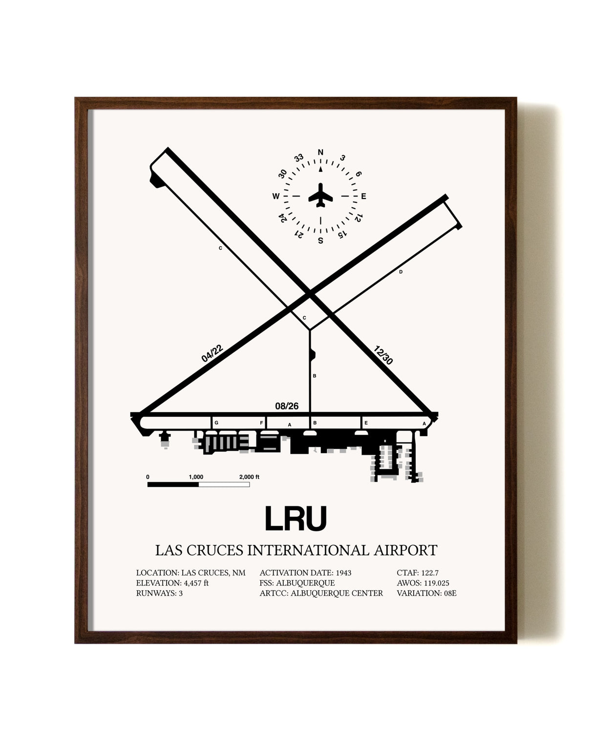 Las Cruces International Airport aviation print in walnut frame