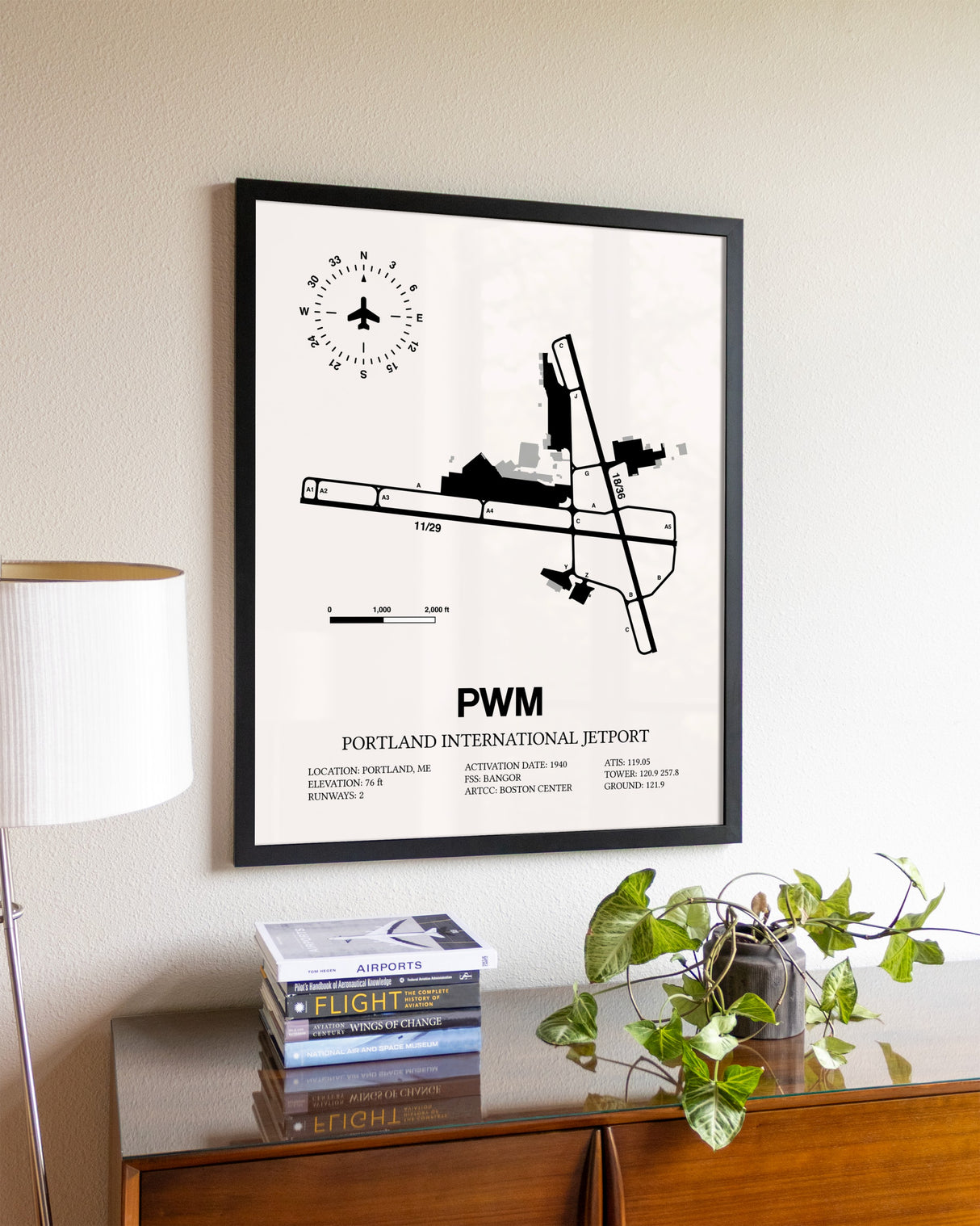 Portland International Jetport aviation wall décor in black wood frame