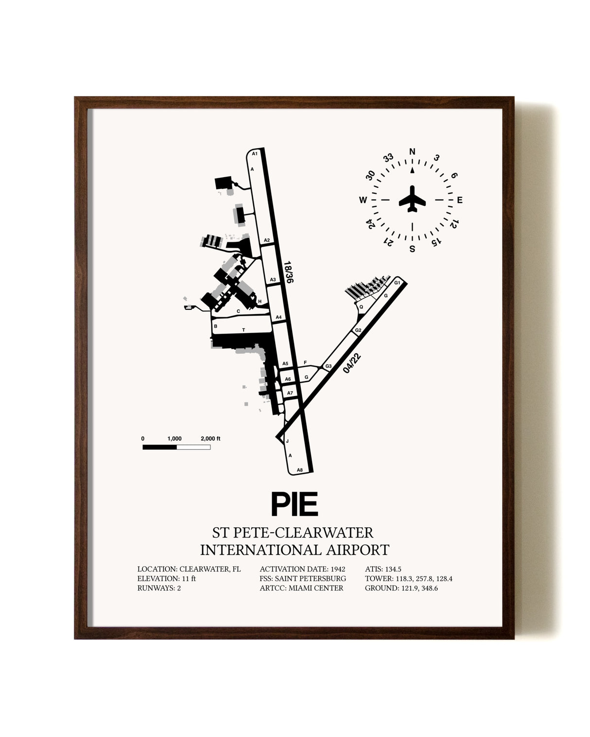 St. Pete-Clearwater International Airport aviation print in walnut frame