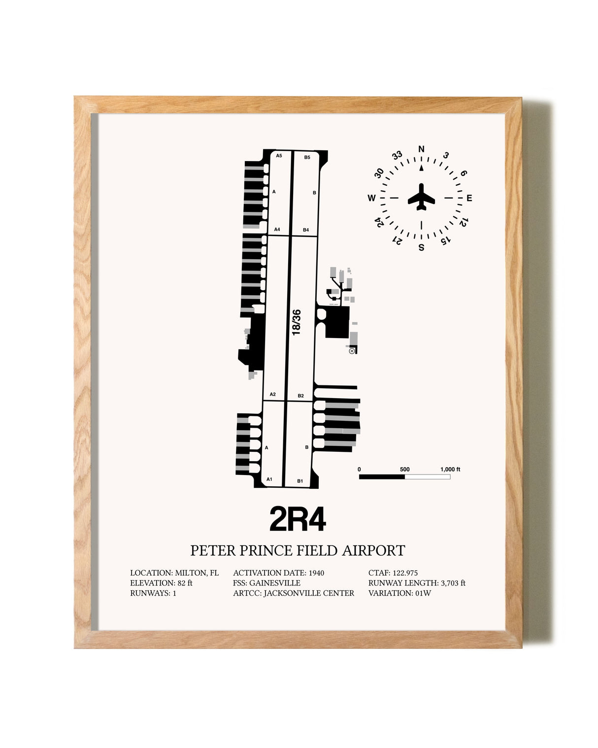 Peter Prince Field Airport framed print in natural wood frame