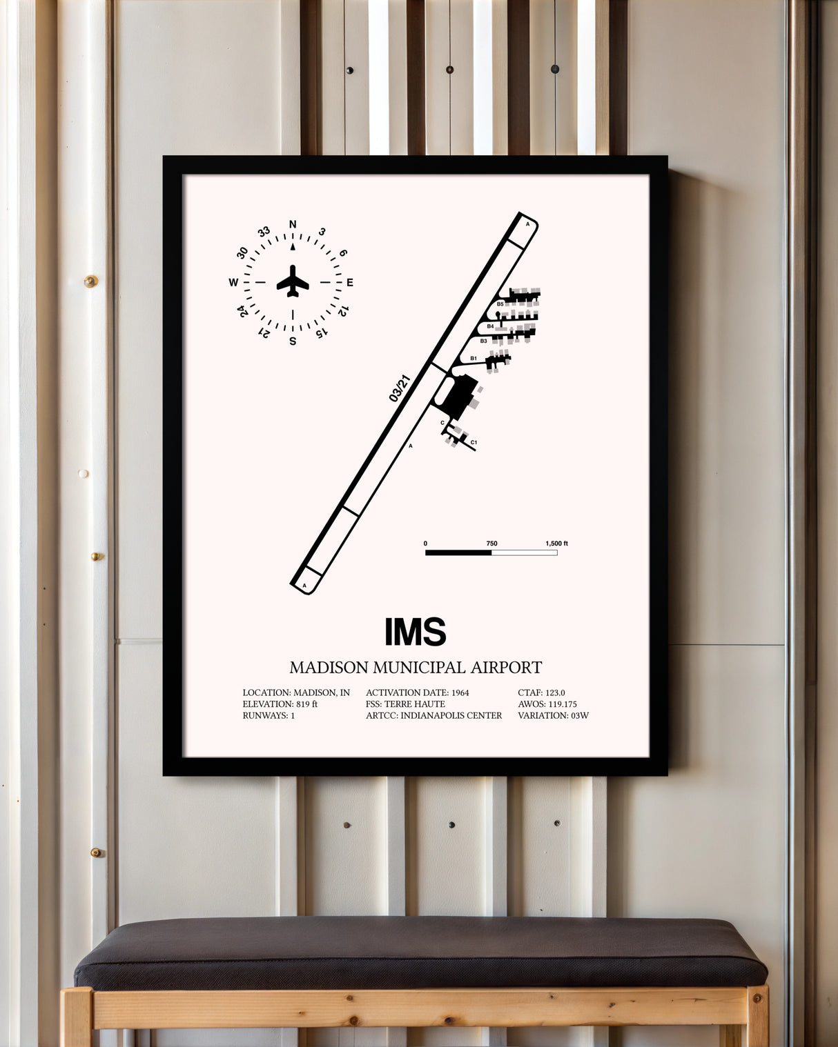 Madison Municipal Airport framed poster displayed in an airplane hangar
