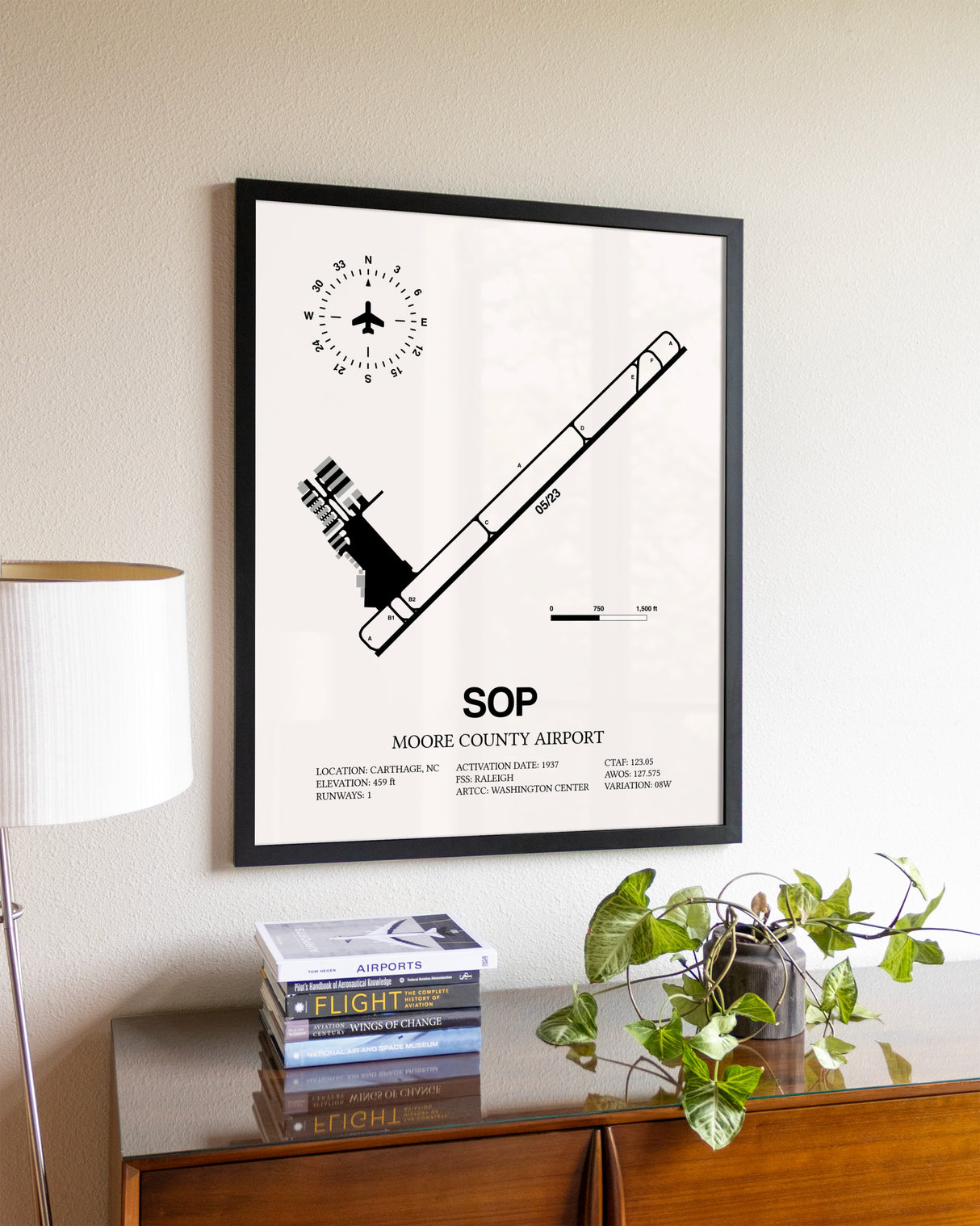Moore County Airport aviation wall décor in black wood frame