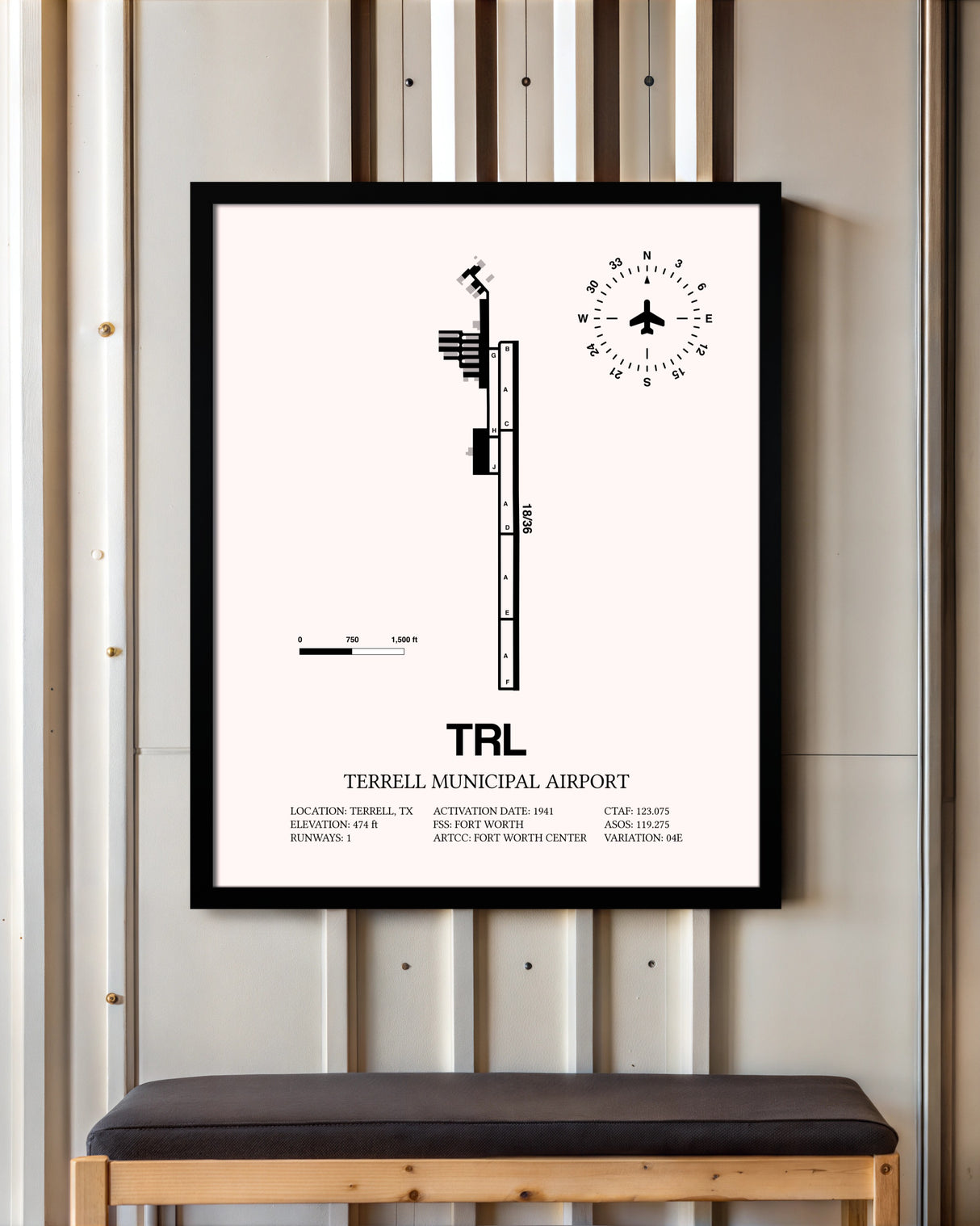 Terrell Municipal Airport framed poster displayed in an airplane hangar