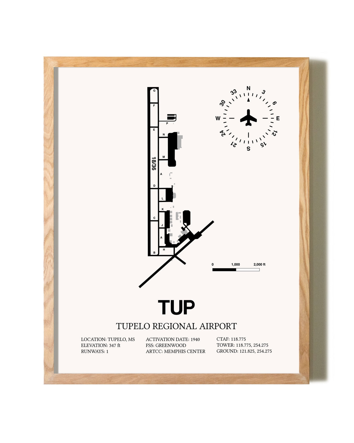 Tupelo Regional Airport framed print in natural wood frame