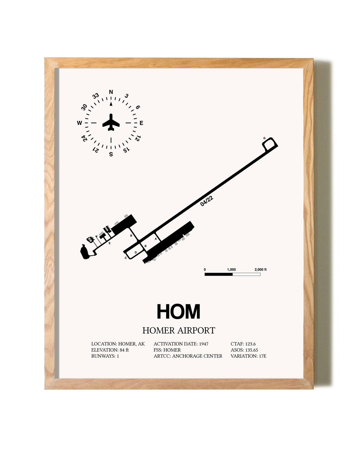 Homer Airport framed print in natural wood frame