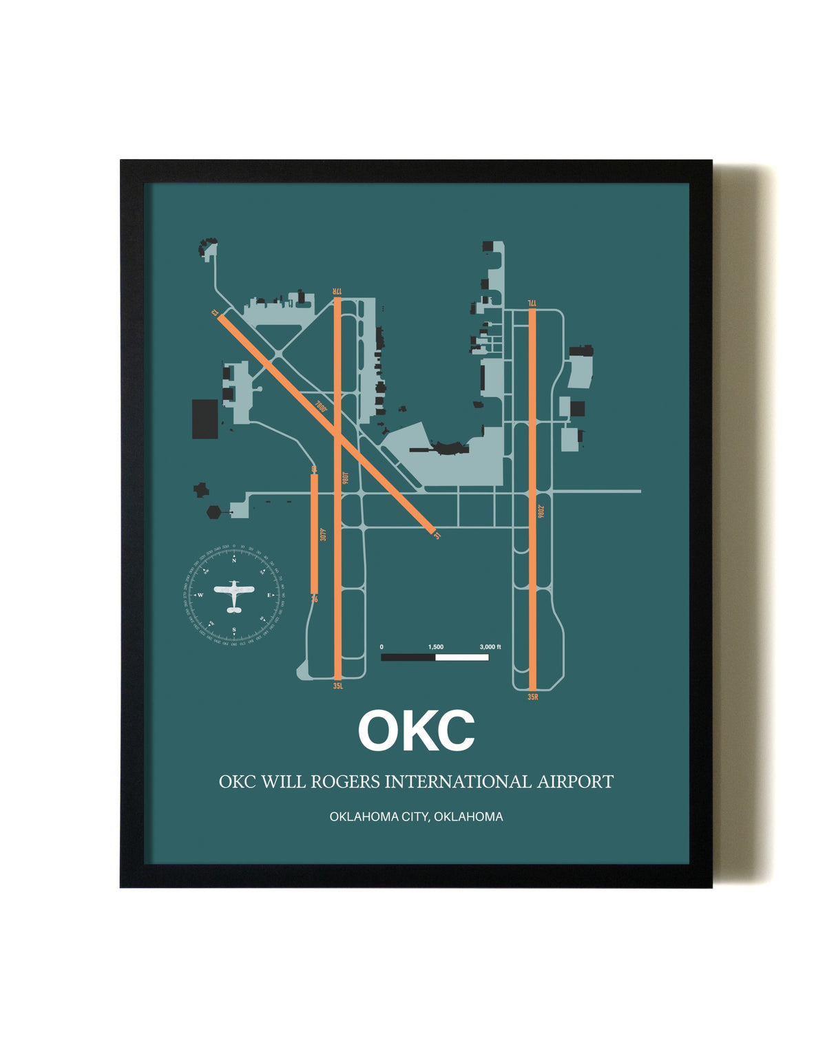 Green OKC Will Rogers International Airport aviation wall décor in black wood frame