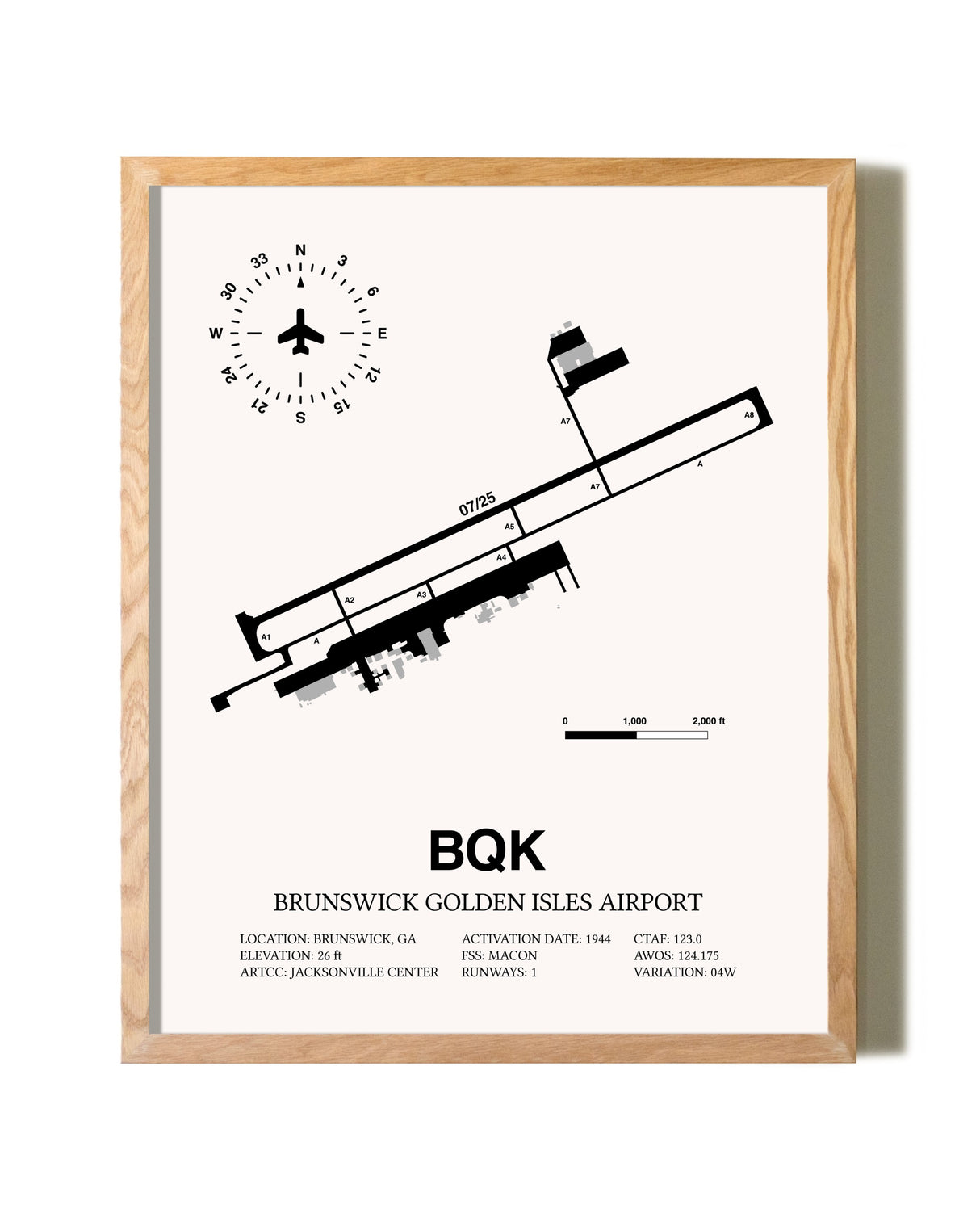 Brunswick Golden Isles Airport framed print in natural wood frame