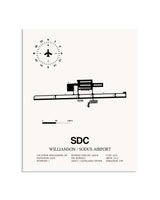 Gray Williamson / Sodus Airport framed poster displayed in an airplane hangar