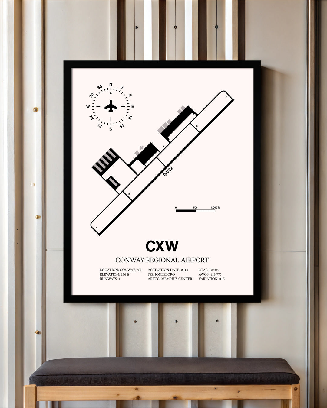 Conway Regional Airport framed poster displayed in an airplane hangar
