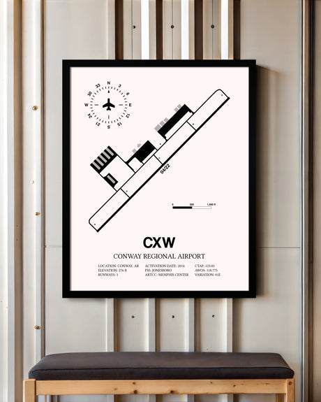 Conway Regional Airport framed poster displayed in an airplane hangar