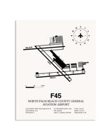 Gray North Palm Beach County General Aviation Airport framed poster displayed in an airplane hangar