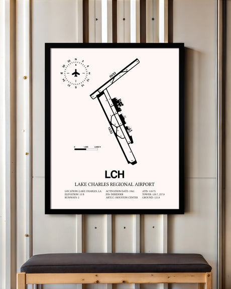 Lake Charles Regional Airport framed poster displayed in an airplane hangar