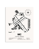Gray Crystal Airport framed poster displayed in an airplane hangar
