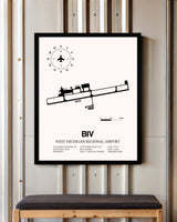 West Michigan Regional Airport framed poster displayed in an airplane hangar