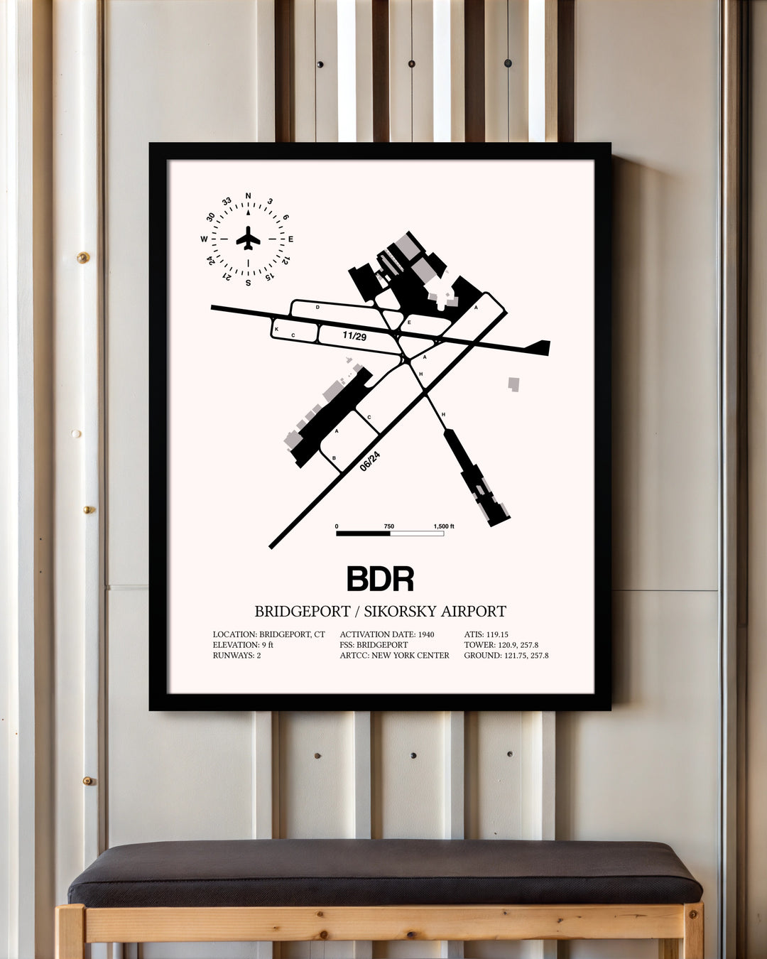 Bridgeport / Sikorsky Airport framed poster displayed in an airplane hangar