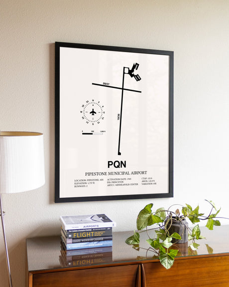 Pipestone Municipal Airport aviation wall décor in black wood frame