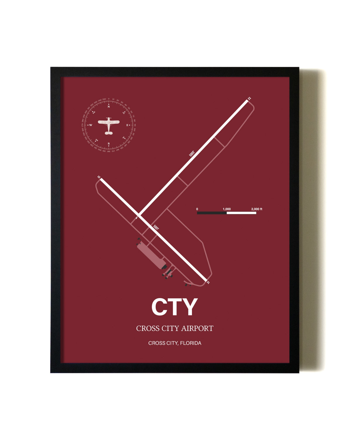 Red Framed Cross City Airport wall art poster in black frame