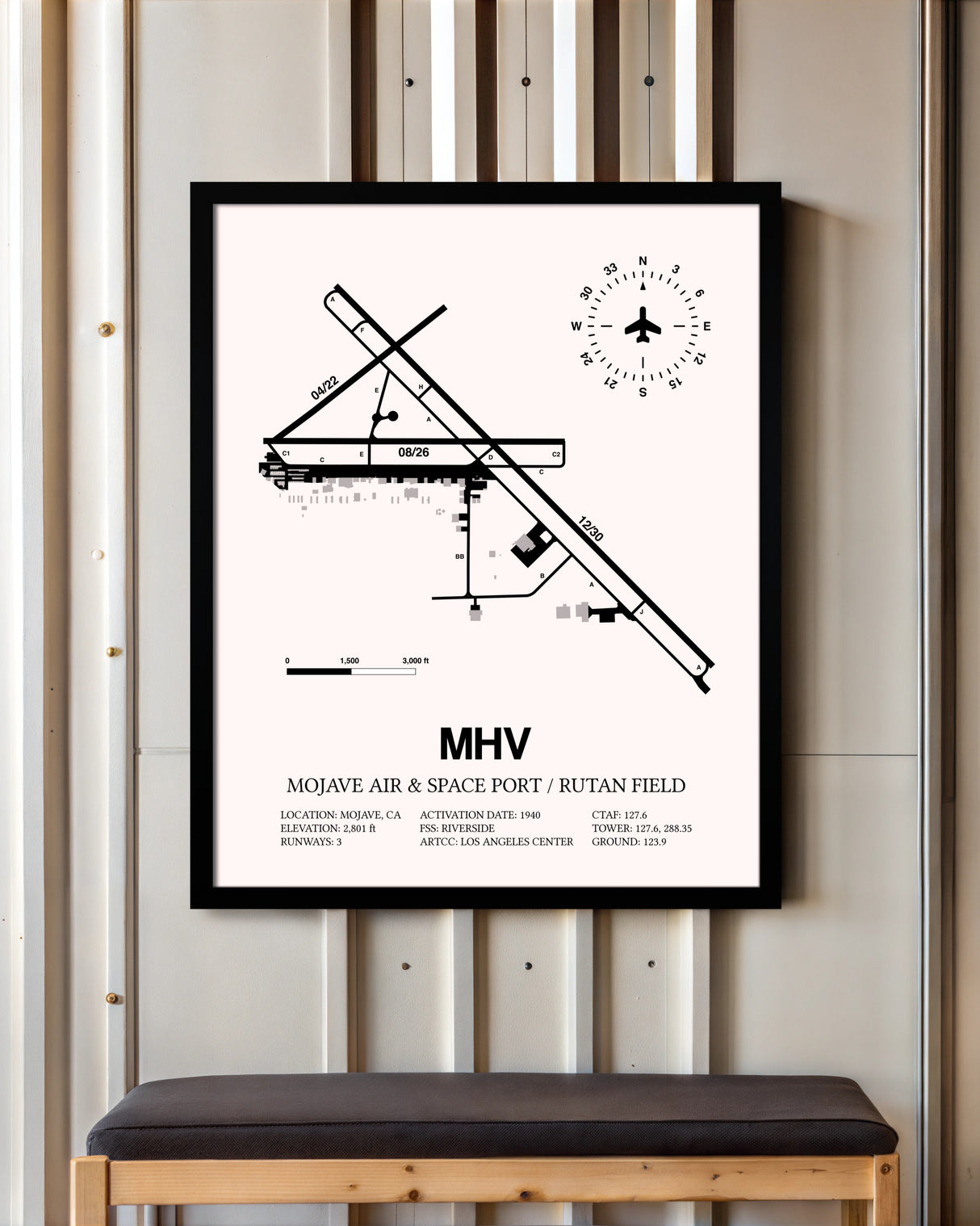 Mojave Air & Space Port / Rutan Field framed poster displayed in an airplane hangar