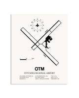 Gray Ottumwa Regional Airport framed poster displayed in an airplane hangar