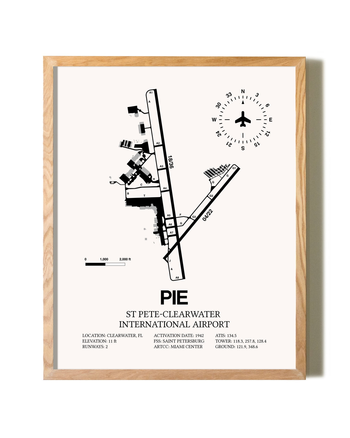 St. Pete-Clearwater International Airport framed print in natural wood frame