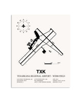 Gray Texarkana Regional Airport-Webb Field framed poster displayed in an airplane hangar