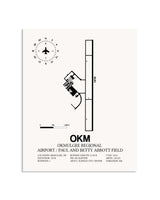Gray Okmulgee Regional Airport / Paul And Betty Abbott Field framed poster displayed in an airplane hangar