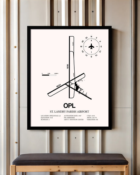 St. Landry Parish Airport framed poster displayed in an airplane hangar