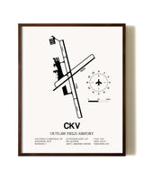 Outlaw Field Airport aviation print in walnut frame