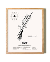 Sandpoint Airport framed print in natural wood frame