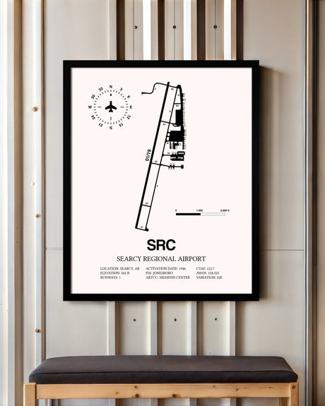 Searcy Regional Airport framed poster displayed in an airplane hangar