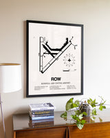 Roswell Air Center Airport aviation wall décor in black wood frame