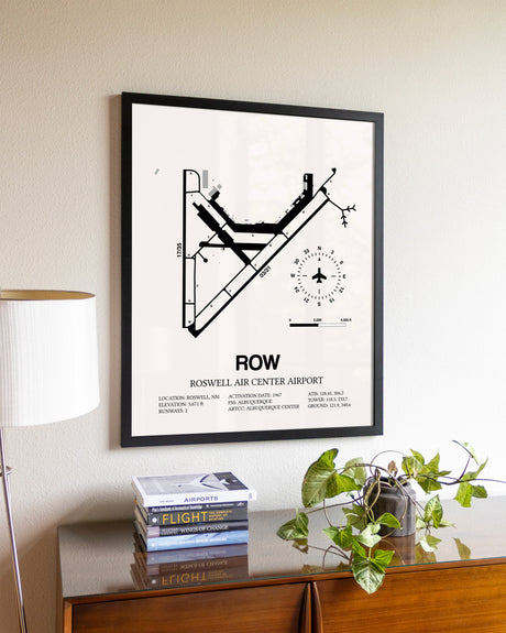 Roswell Air Center Airport aviation wall décor in black wood frame