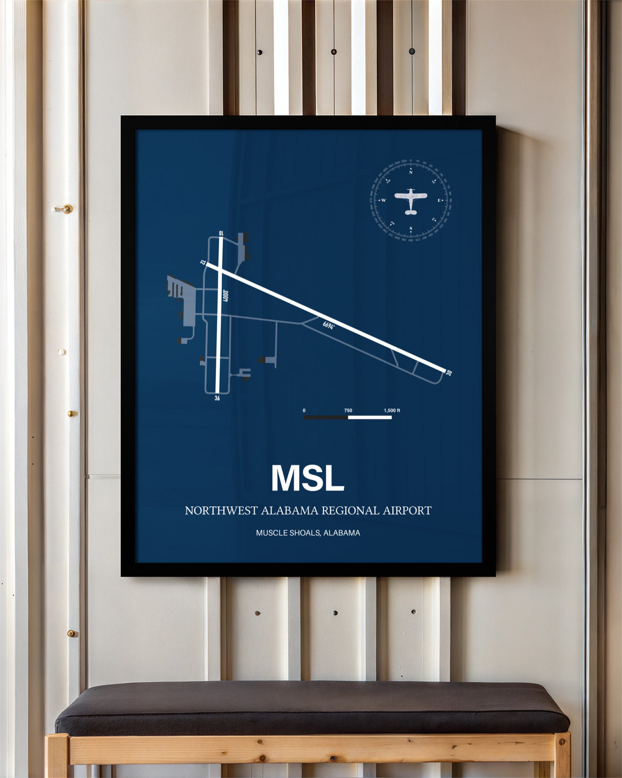 Northwest Alabama Regional Airport framed poster displayed in an airplane hangar