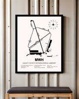 Grant County International Airport framed poster displayed in an airplane hangar