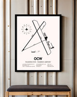 Washington-Warren Airport framed poster displayed in an airplane hangar