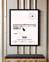 Mason Jewett Field Airport framed poster displayed in an airplane hangar