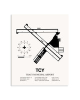 Gray Tracy Municipal Airport framed poster displayed in an airplane hangar