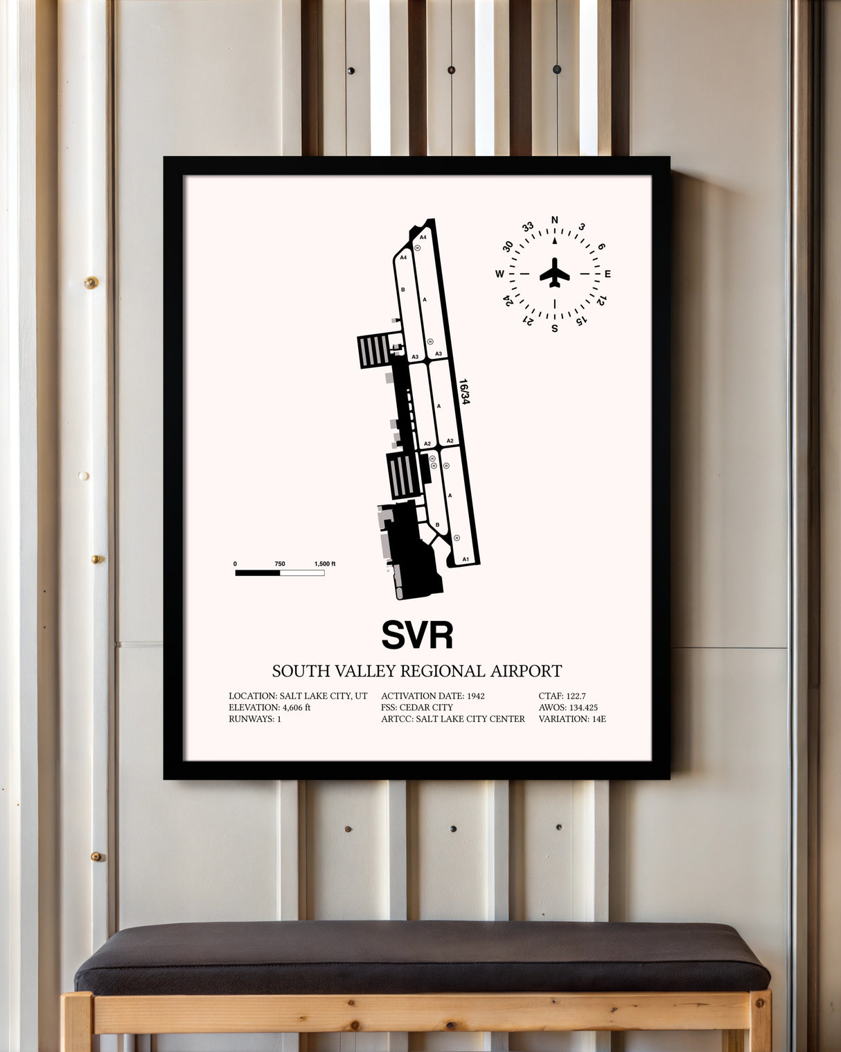 South Valley Regional Airport framed poster displayed in an airplane hangar