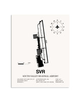 Gray South Valley Regional Airport framed poster displayed in an airplane hangar