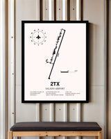 Salado Airport framed poster displayed in an airplane hangar