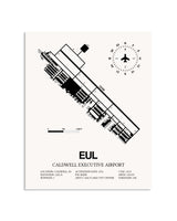 Gray Caldwell Executive Airport framed poster displayed in an airplane hangar