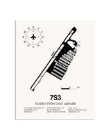 Gray Stark's Twin Oaks Airpark framed poster displayed in an airplane hangar