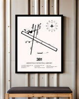 Greenville Municipal Airport framed poster displayed in an airplane hangar