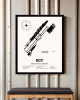 Birchwood Airport framed poster displayed in an airplane hangar